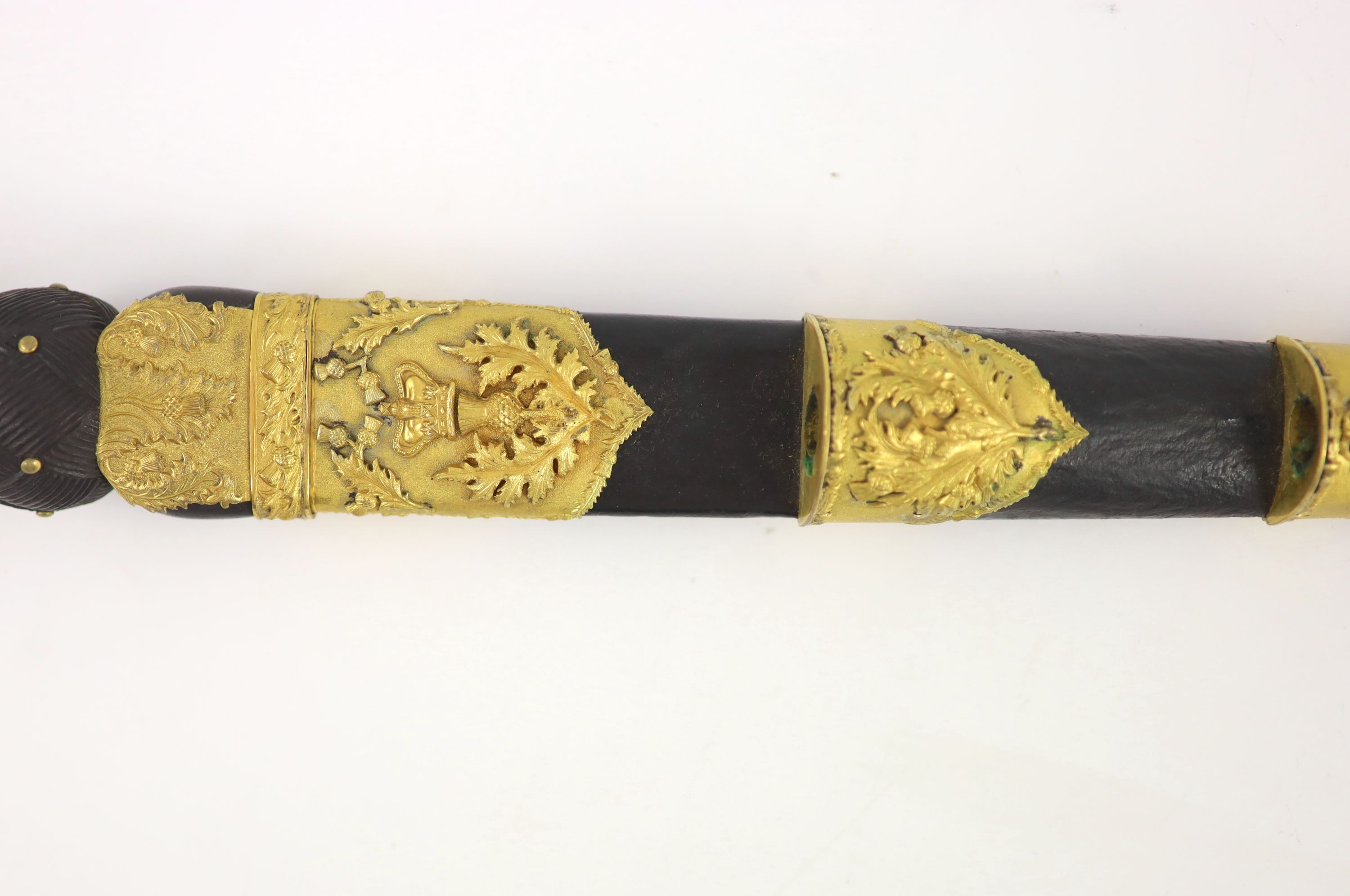 A 19th century Scottish ormolu mounted dirk and a similar skean dubh